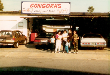 The Gongora family outside their shop beneath the original sign in the 1980s